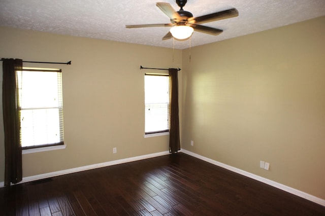 1102 Fairways, Lebanon, TN 37087 - spare room with a textured ceiling, ceiling fan, dark wood-style floors, and healthy amount of natural light