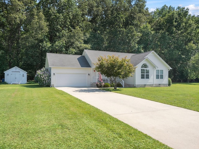 43 Shady Cove Ct, Estill Springs, TN 37330 - view of front of property featuring crawl space, concrete driveway, a front lawn, an attached garage, and a shed