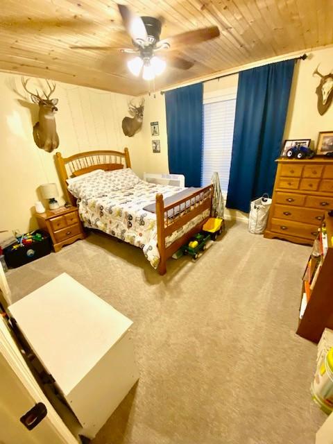 43 Shady Cove Ct, Estill Springs, TN 37330 - carpeted bedroom with wooden ceiling and a ceiling fan