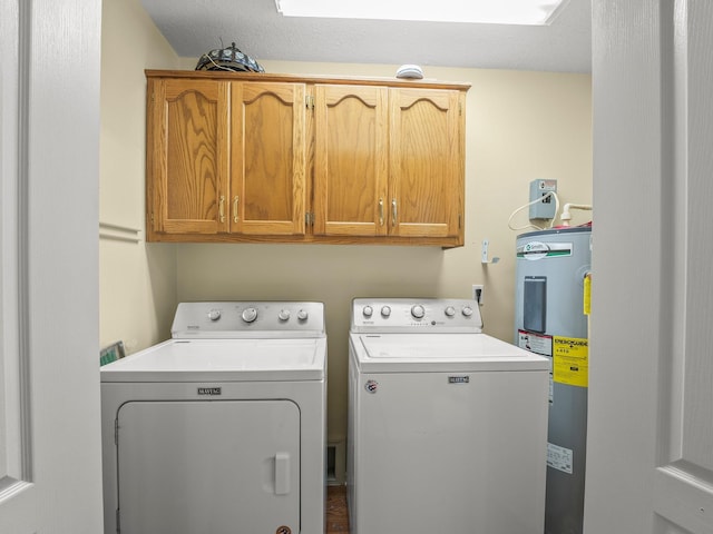 43 Shady Cove Ct, Estill Springs, TN 37330 - laundry area with water heater, washer and clothes dryer, and cabinet space