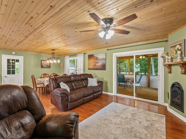 43 Shady Cove Ct, Estill Springs, TN 37330 - living room featuring a chandelier, wood ceiling, ceiling fan, and wood finished floors