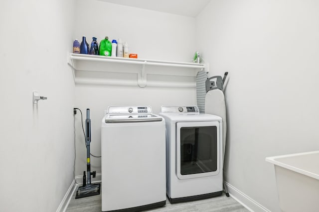 1361 Neil Rd, Chapel Hill, TN 37034 - laundry room featuring washing machine and clothes dryer and wood finished floors