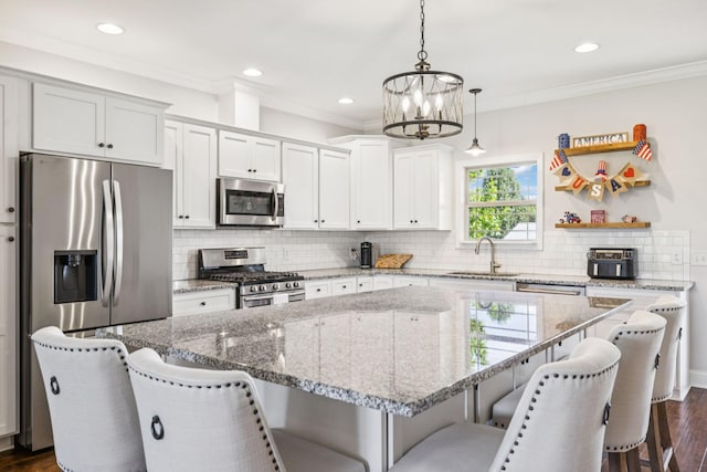 1361 Neil Rd, Chapel Hill, TN 37034 - kitchen with stainless steel appliances, a center island, dark wood-style floors, a chandelier, and backsplash