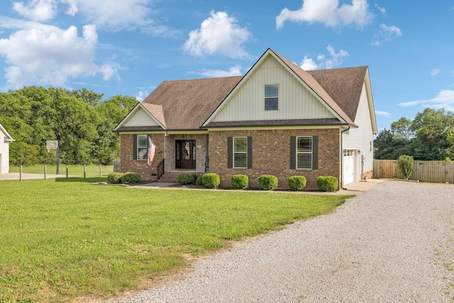 1361 Neil Rd, Chapel Hill, TN 37034 - view of front facade featuring driveway, an attached garage, brick siding, and roof with shingles