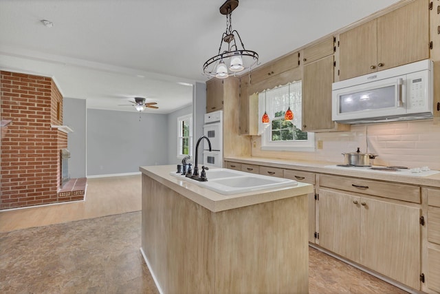 5347 Shady Grove Rd, Morrison, TN 37357 - kitchen featuring white appliances, light brown cabinets, light countertops, tasteful backsplash, and pendant lighting