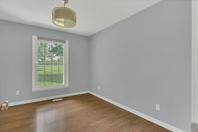 5347 Shady Grove Rd, Morrison, TN 37357 - spare room with wood finished floors and baseboards