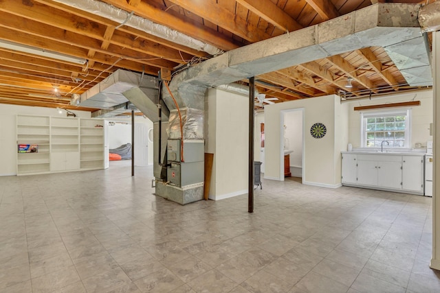 5347 Shady Grove Rd, Morrison, TN 37357 - below grade area featuring heating unit and baseboards