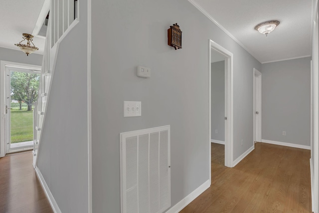5347 Shady Grove Rd, Morrison, TN 37357 - corridor with wood finished floors and ornamental molding