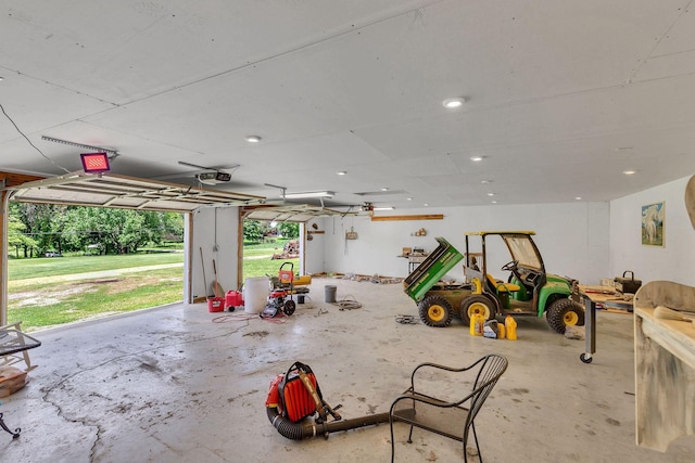 5347 Shady Grove Rd, Morrison, TN 37357 - garage featuring a garage door opener