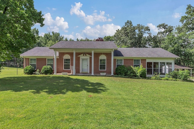 5347 Shady Grove Rd, Morrison, TN 37357 - view of front of property with a front lawn, brick siding, and a chimney