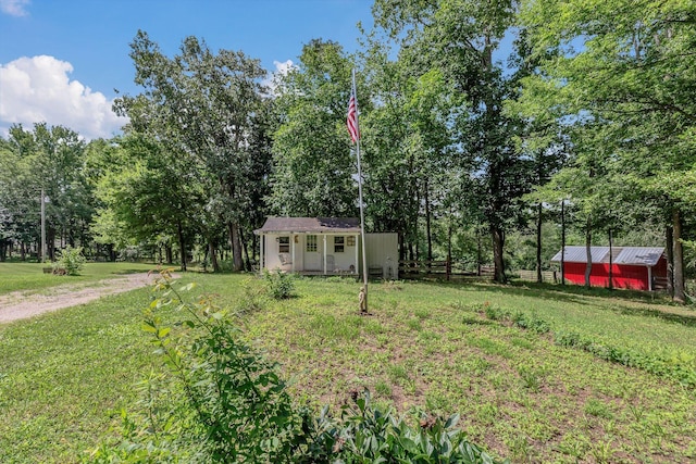 5347 Shady Grove Rd, Morrison, TN 37357 - view of yard with a storage unit and view of scattered trees