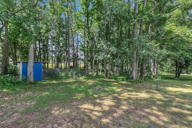 5347 Shady Grove Rd, Morrison, TN 37357 - view of grassy yard featuring a storage shed