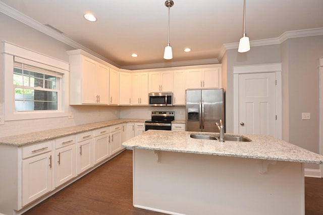 1019 N Maple St Unit 2D, Murfreesboro, TN 37130 - kitchen featuring appliances with stainless steel finishes, ornamental molding, white cabinets, dark wood finished floors, and decorative light fixtures
