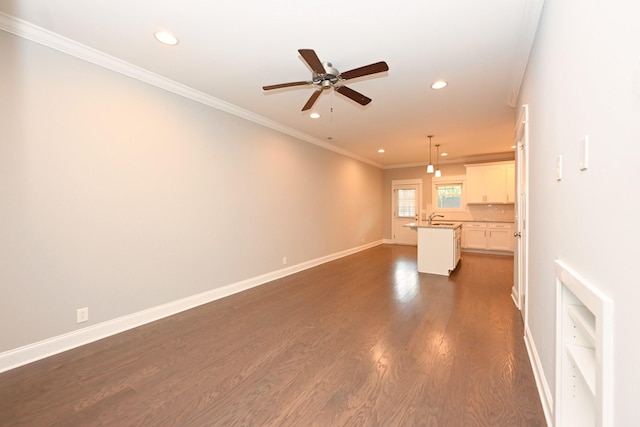 1019 N Maple St Unit 2D, Murfreesboro, TN 37130 - unfurnished living room featuring recessed lighting, dark wood-style floors, a ceiling fan, and crown molding