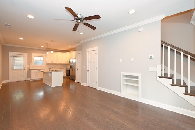 1019 N Maple St Unit 2D, Murfreesboro, TN 37130 - unfurnished living room with recessed lighting, ceiling fan, crown molding, dark wood-style floors, and built in features