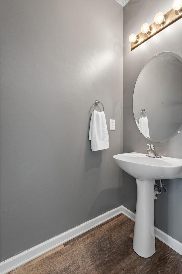 4061 Locerbie Cir, Spring Hill, TN 37174 - bathroom with wood finished floors and baseboards