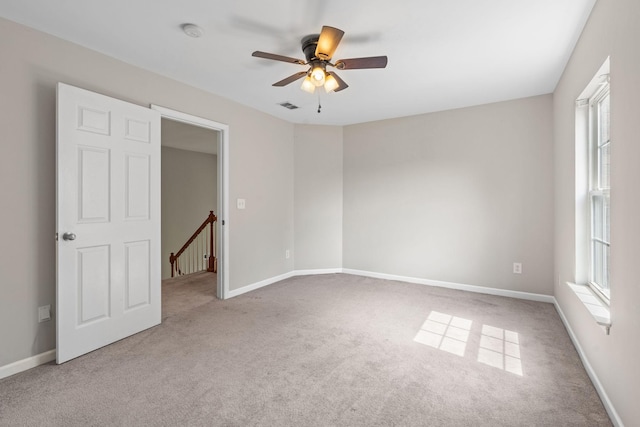 4061 Locerbie Cir, Spring Hill, TN 37174 - unfurnished room featuring carpet floors, a smoke detector, a ceiling fan, and plenty of natural light
