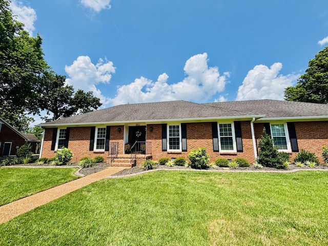 3011 Regency Park Dr, Murfreesboro, TN 37129 - single story home with brick siding, a front lawn, and roof with shingles