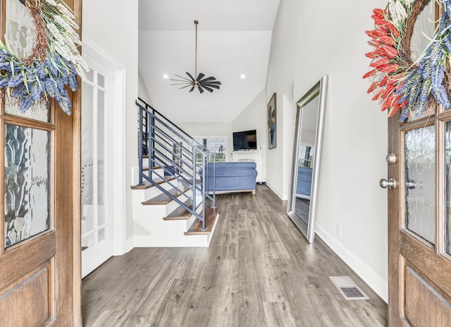 329 Clarabelle Ln, Clarksville, TN 37040 - entrance foyer featuring high vaulted ceiling, wood finished floors, and stairway