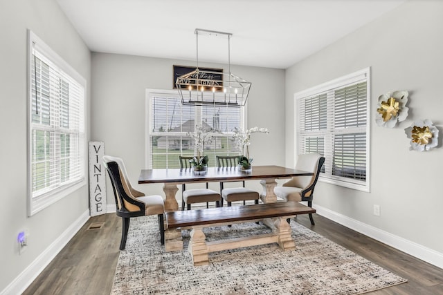 329 Clarabelle Ln, Clarksville, TN 37040 - dining area featuring a chandelier and dark wood-style floors