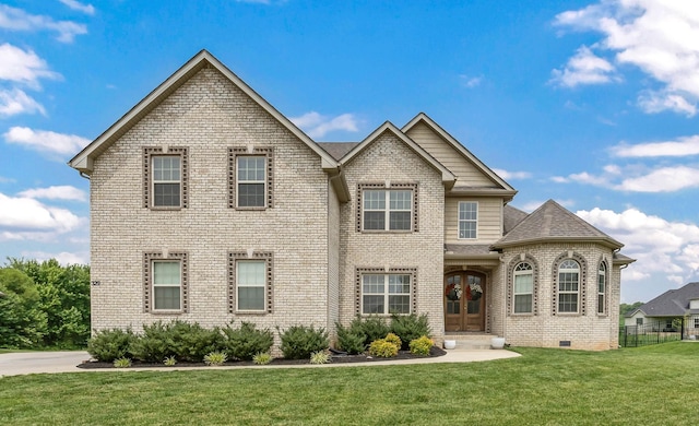 329 Clarabelle Ln, Clarksville, TN 37040 - view of front facade with brick siding, french doors, and a shingled roof