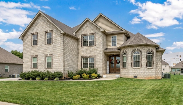 329 Clarabelle Ln, Clarksville, TN 37040 - view of front of home featuring french doors, brick siding, a front yard, and a shingled roof