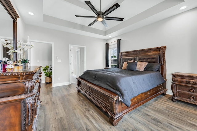 329 Clarabelle Ln, Clarksville, TN 37040 - bedroom with a tray ceiling, wood finished floors, recessed lighting, and a ceiling fan