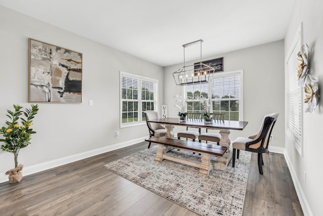 329 Clarabelle Ln, Clarksville, TN 37040 - dining room with dark wood-type flooring and a chandelier