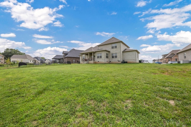 329 Clarabelle Ln, Clarksville, TN 37040 - rear view of property featuring brick siding and a residential view