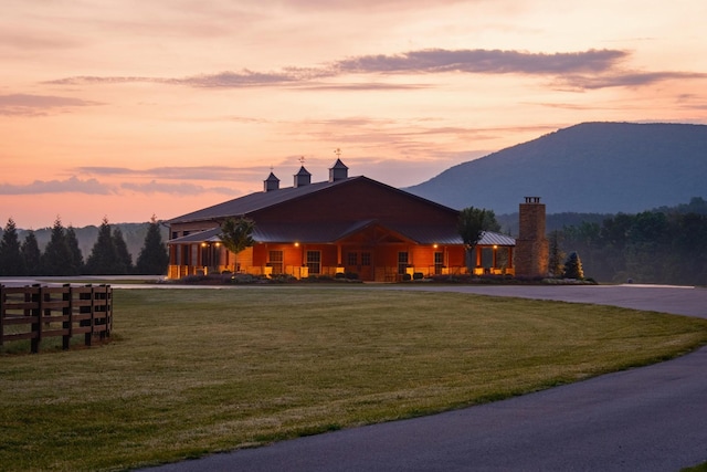 6971 W Cove Rd, Chickamauga, GA 30707 - view of front facade featuring a chimney, a yard, and a mountain view