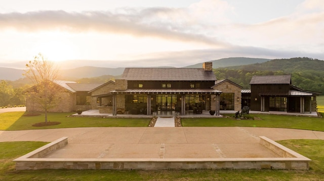 6971 W Cove Rd, Chickamauga, GA 30707 - view of property's community featuring a mountain view and a lawn