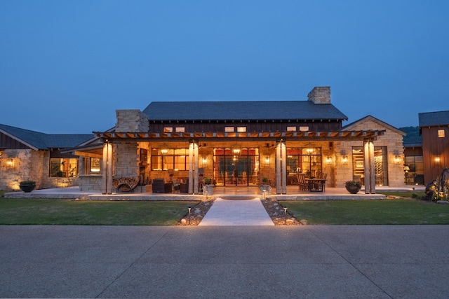 6971 W Cove Rd, Chickamauga, GA 30707 - rear view of house with a chimney, a pergola, a patio, and stone siding