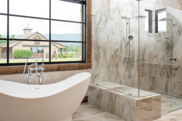 6971 W Cove Rd, Chickamauga, GA 30707 - bathroom with marble tiled flooring, a freestanding tub, a marble finish shower, and plenty of natural light