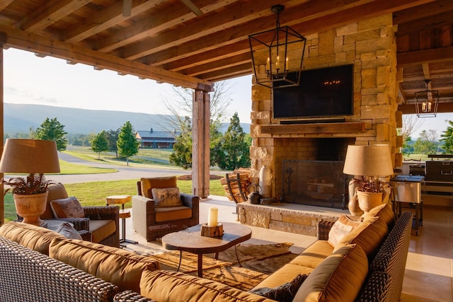 6971 W Cove Rd, Chickamauga, GA 30707 - view of patio / terrace with an outdoor living space with a fireplace