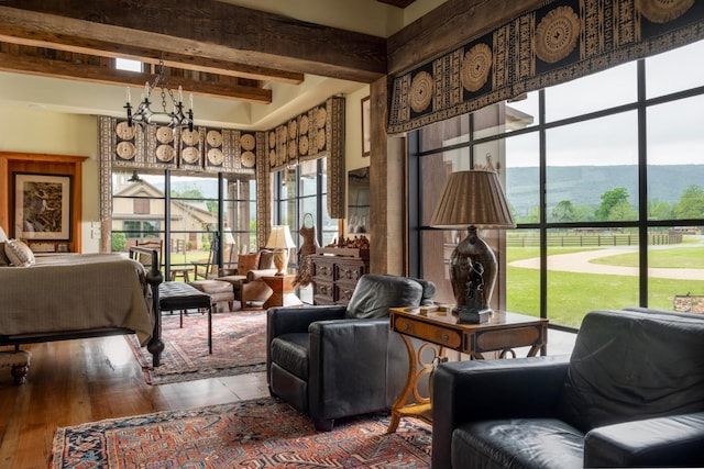 6971 W Cove Rd, Chickamauga, GA 30707 - living room featuring beam ceiling and hardwood / wood-style flooring