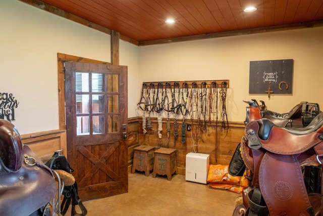 6971 W Cove Rd, Chickamauga, GA 30707 - misc room with a wainscoted wall, wood walls, recessed lighting, wood ceiling, and finished concrete floors