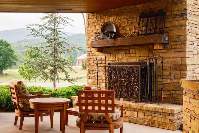 6971 W Cove Rd, Chickamauga, GA 30707 - view of patio / terrace featuring an outdoor stone fireplace and a mountain view