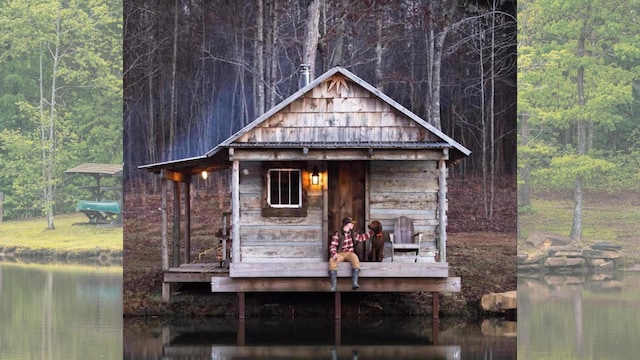 1170 Ascalon Rd, Rising Fawn, GA 30738 - view of outdoor structure featuring a water view and a wooded view