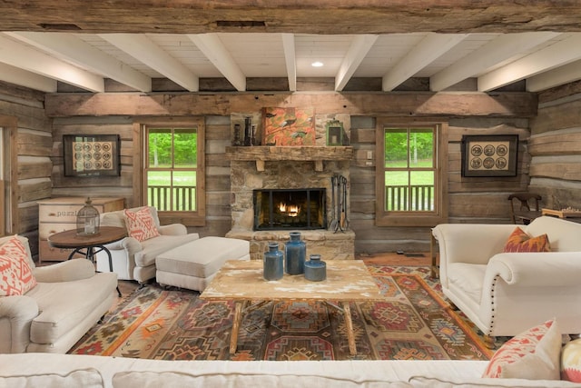1170 Ascalon Rd, Rising Fawn, GA 30738 - living room with wood walls, a stone fireplace, wood finished floors, and a wood ceiling with exposed beams