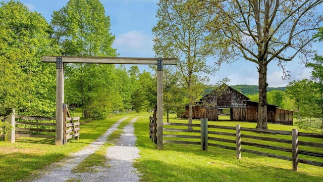 1170 Ascalon Rd, Rising Fawn, GA 30738 - view of yard with driveway, an outdoor structure, and a barn