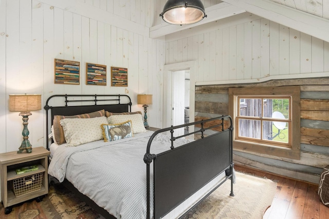 1170 Ascalon Rd, Rising Fawn, GA 30738 - bedroom with hardwood / wood-style floors, wood walls, beamed ceiling, and high vaulted ceiling