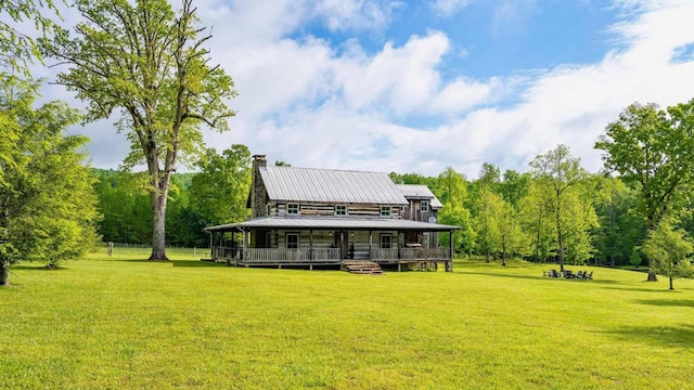 1170 Ascalon Rd, Rising Fawn, GA 30738 - rear view of property featuring a yard, a chimney, and a metal roof
