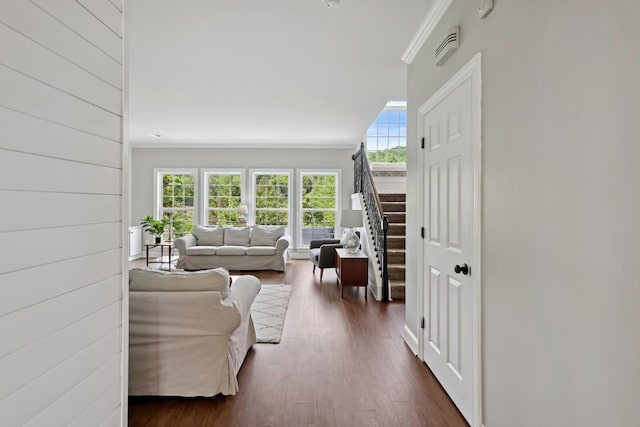 1209 Firth Ct, Franklin, TN 37067 - living room featuring crown molding, stairs, and dark wood finished floors