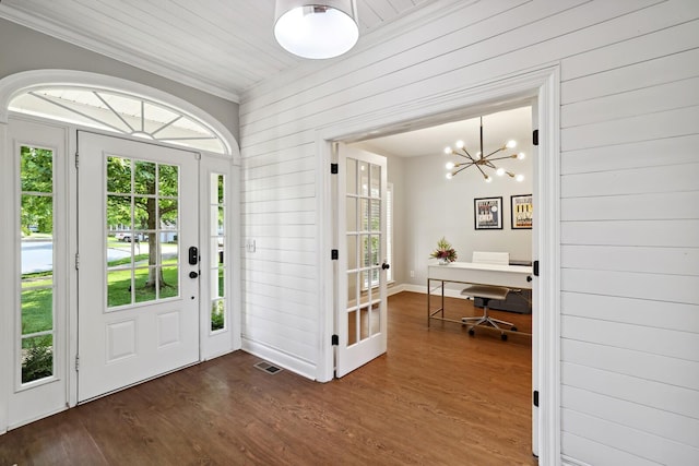 1209 Firth Ct, Franklin, TN 37067 - foyer with wood walls, a chandelier, crown molding, and dark wood finished floors