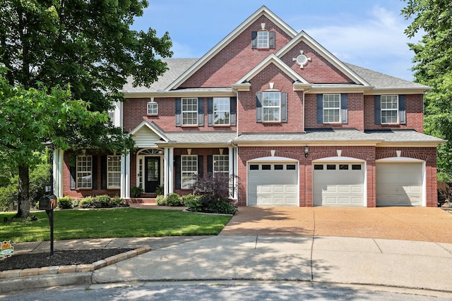 1209 Firth Ct, Franklin, TN 37067 - view of front of property with a garage, driveway, a front lawn, brick siding, and covered porch
