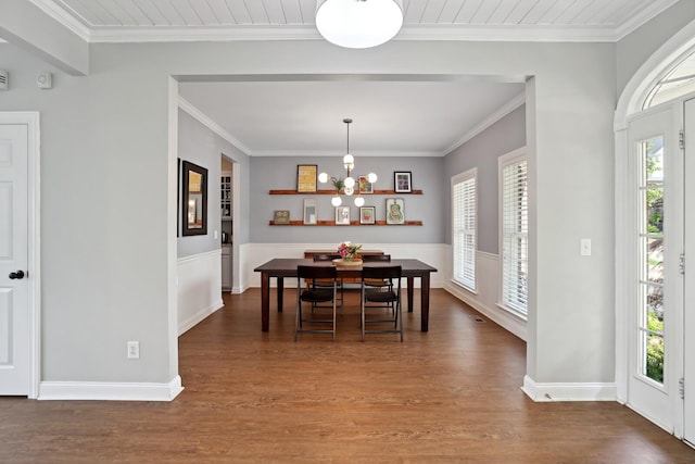 1209 Firth Ct, Franklin, TN 37067 - dining space with wood finished floors, a chandelier, and crown molding