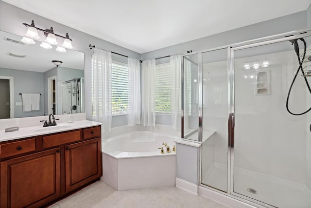 1209 Firth Ct, Franklin, TN 37067 - bathroom featuring a stall shower, vanity, a garden tub, and tile patterned flooring