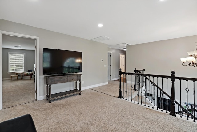 1209 Firth Ct, Franklin, TN 37067 - hallway with carpet flooring, attic access, an upstairs landing, a chandelier, and recessed lighting
