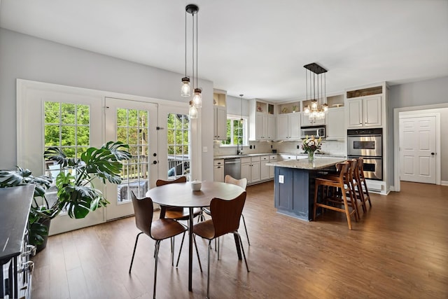 1209 Firth Ct, Franklin, TN 37067 - dining room featuring dark wood-style flooring and a chandelier