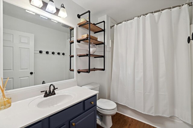 1209 Firth Ct, Franklin, TN 37067 - full bath with wood finished floors, vanity, and shower / tub combo with curtain